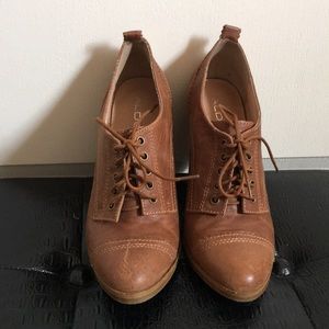Never worn genuine leather lace up wedge booties